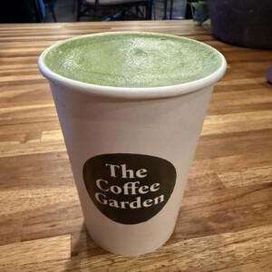 Hot Matcha Latte with smooth matcha microfoam at The Coffee Garden in Uptown Houston.