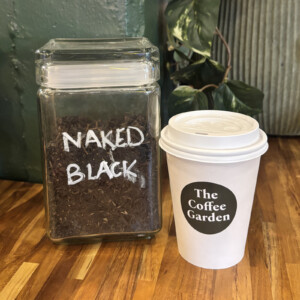 Naked Black premium loose-leaf tea with The Coffee Garden cup in Uptown Houston.