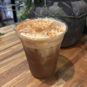 Pumpkin Cream Cold Brew with pumpkin cold foam at The Coffee Garden in Uptown Houston.