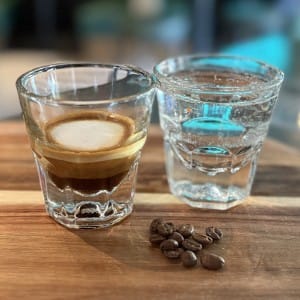 Macchiato Coffee served with Topo Chico